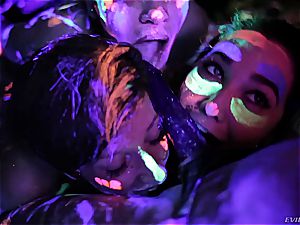 scorching lesbians frolicking with fluorescent body paint