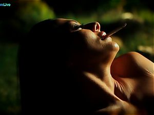 sizzling Sandra Romain smokes a ciggie and strokes